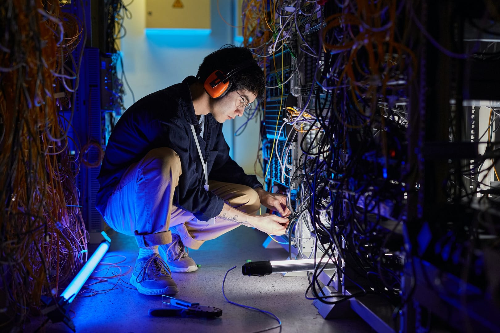 Asian Man Working with Network Server